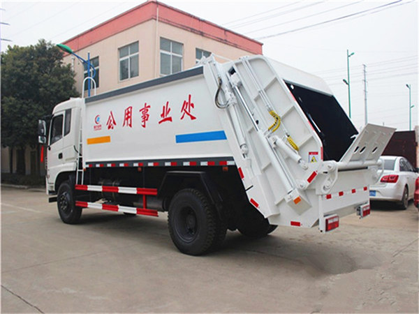 东风天龙后双桥压缩式垃圾车